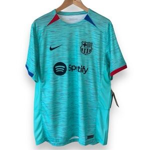 Nike 2023/2024 FC Barcelona Green Away Soccer Jersey.